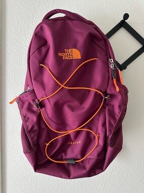 The North Face Berry Backpack with Orange Bungee Accents